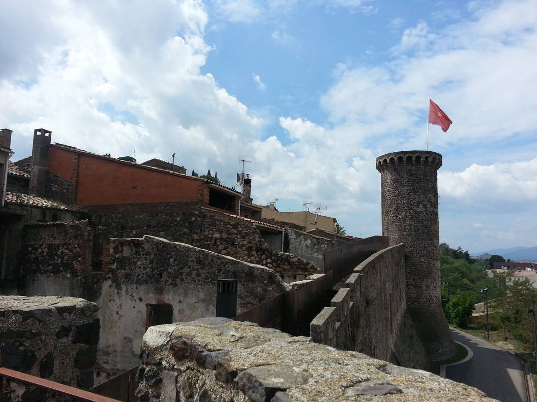 Fortress battlements in the medieval village of Hostalric. The village is literally built around the fortress, sometimes touching its walls.