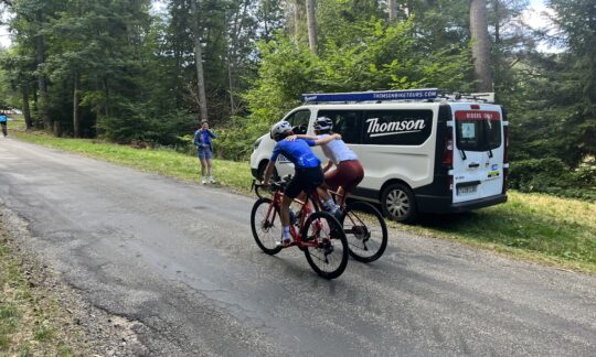 Thomson Bike Tours ride leader helps a guest conquer their ambitions on the big climbs of the Tour de France